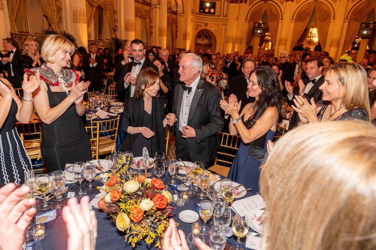 Standing ovation for this year's Henry Crown Leadership Award recipients Mr. and Mrs. Bezos.